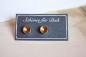 Preview: Sparkling shell ear studs in gold gold