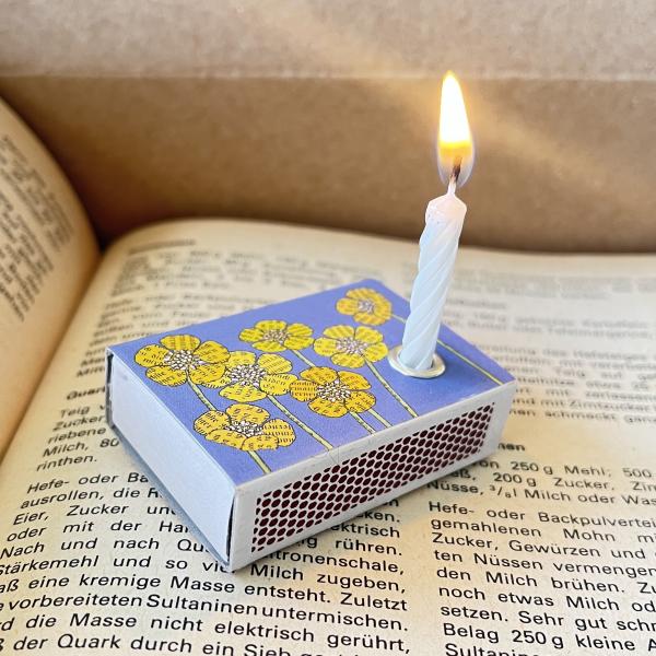 light on a box - yellow flowers